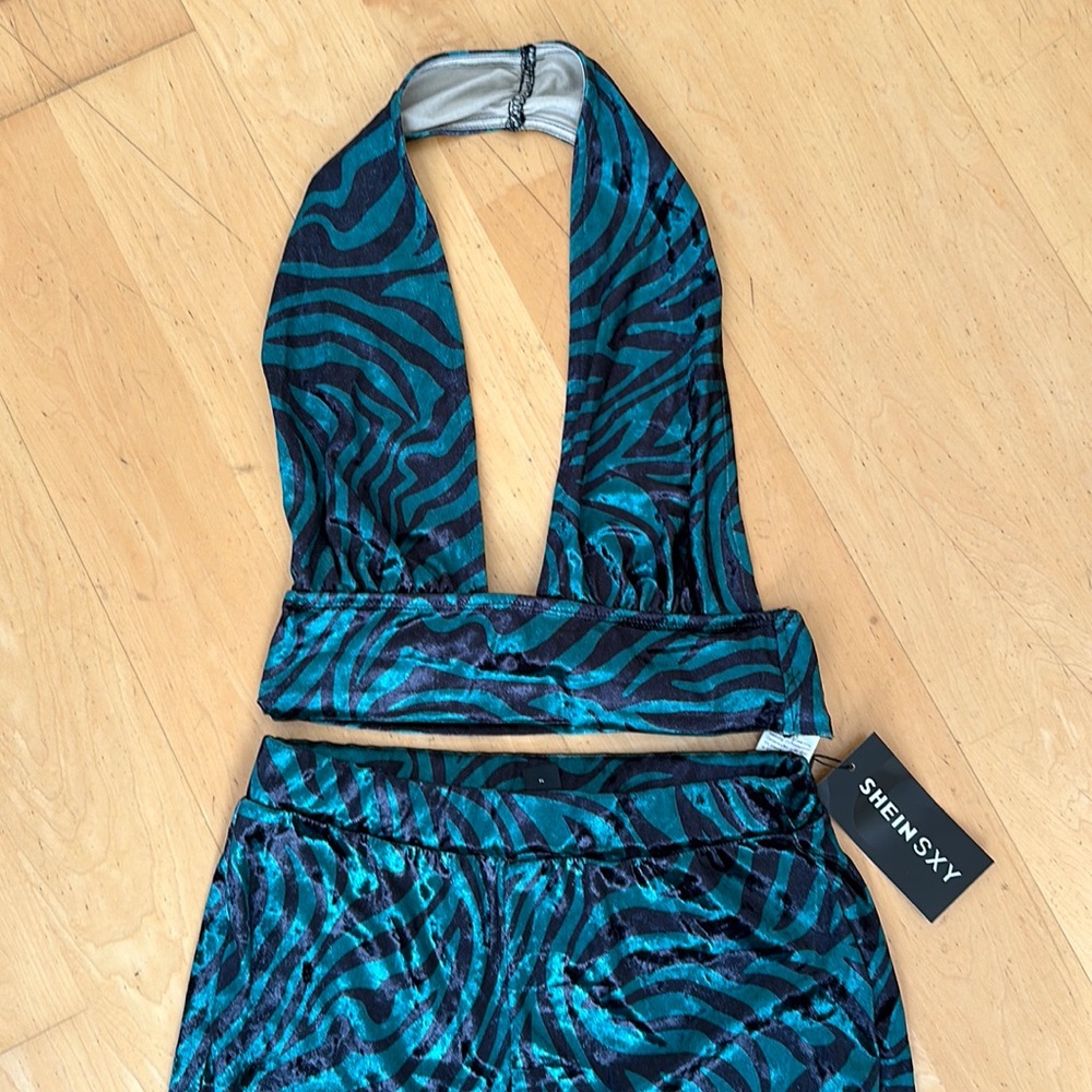 SHEIN dark green zebra print backless velvet crop top and flare pants.